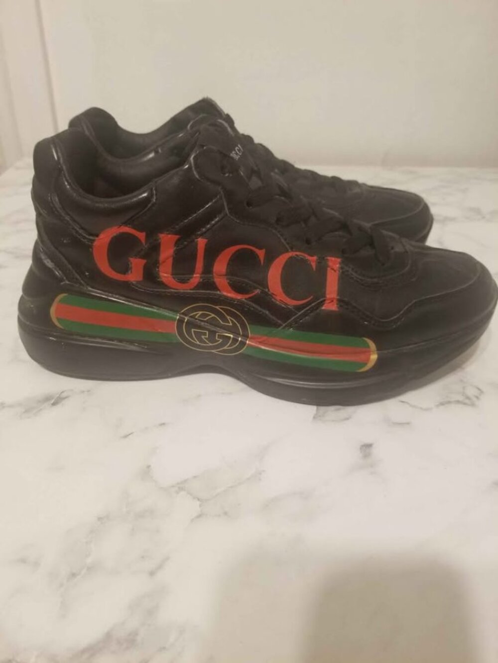 GUCCI Rhyton black logo trainers